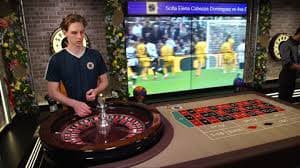 Mobile screen showing Relax Gaming game lobby with slot titles, live tables, and game categories displayed in grid layout